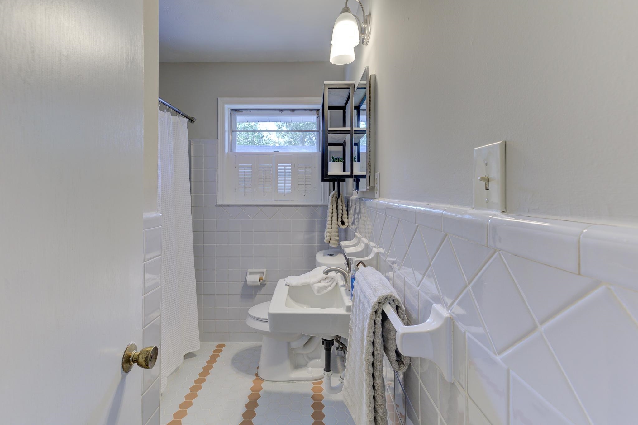 2823 Altruria Road Bartlett, TN 38134 - Photo 21 of 40 a bathroom with a sink and mirror
