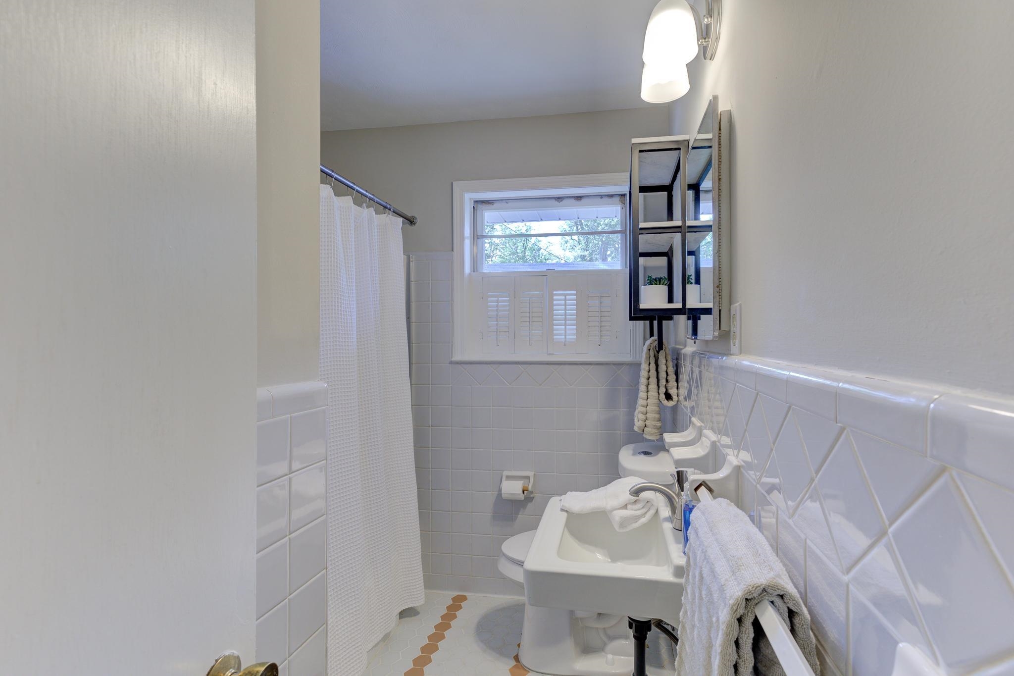 2823 Altruria Road Bartlett, TN 38134 - Photo 22 of 40 a bathroom with a sink and a mirror