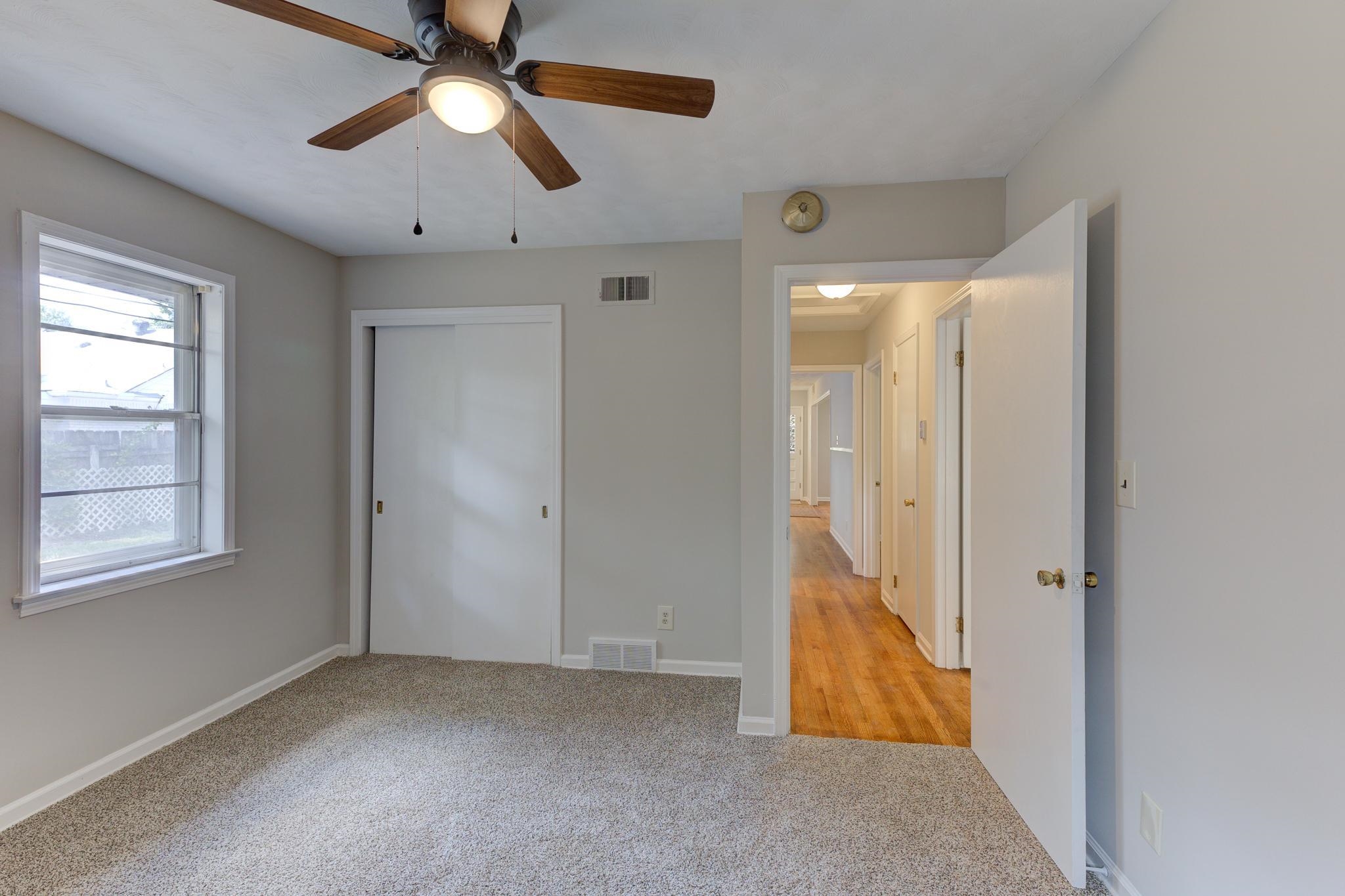 2823 Altruria Road Bartlett, TN 38134 - Photo 25 of 40 a view of an empty room with window and chandelier fan