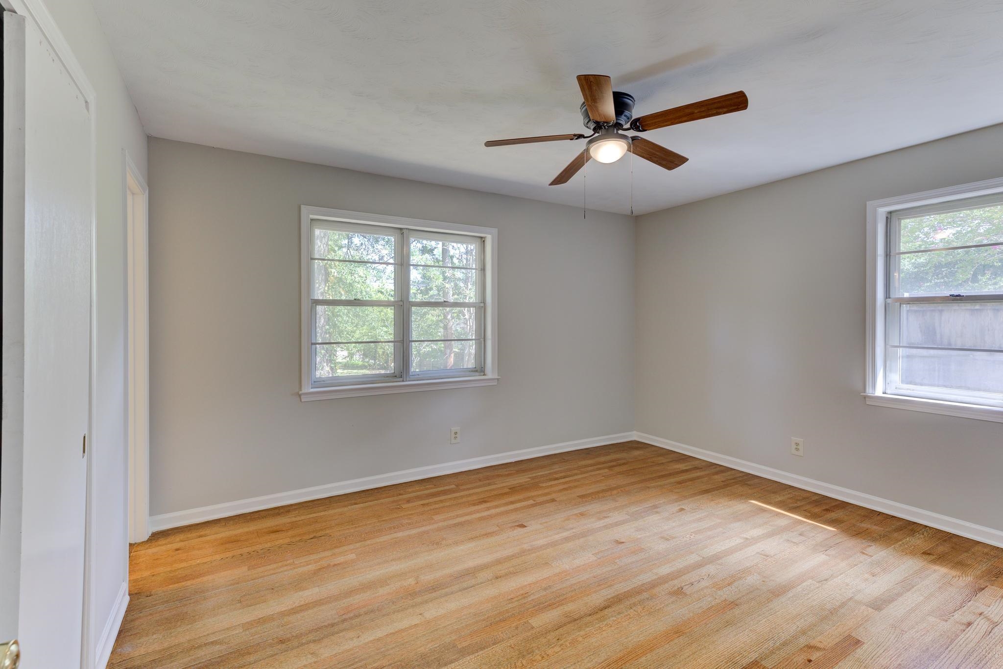 2823 Altruria Road Bartlett, TN 38134 - Photo 26 of 40 wooden floor in an empty room with a window