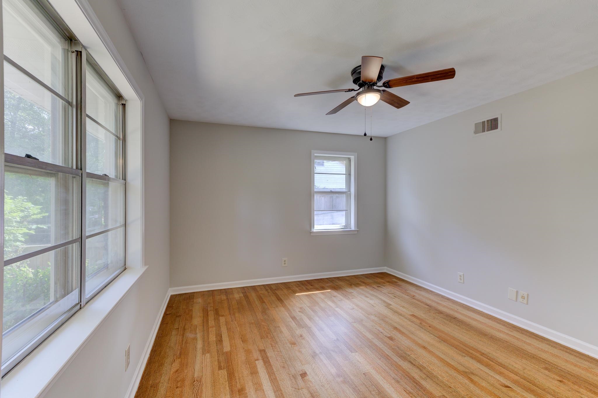 2823 Altruria Road Bartlett, TN 38134 - Photo 29 of 40 a view of empty room with wooden floor and fan