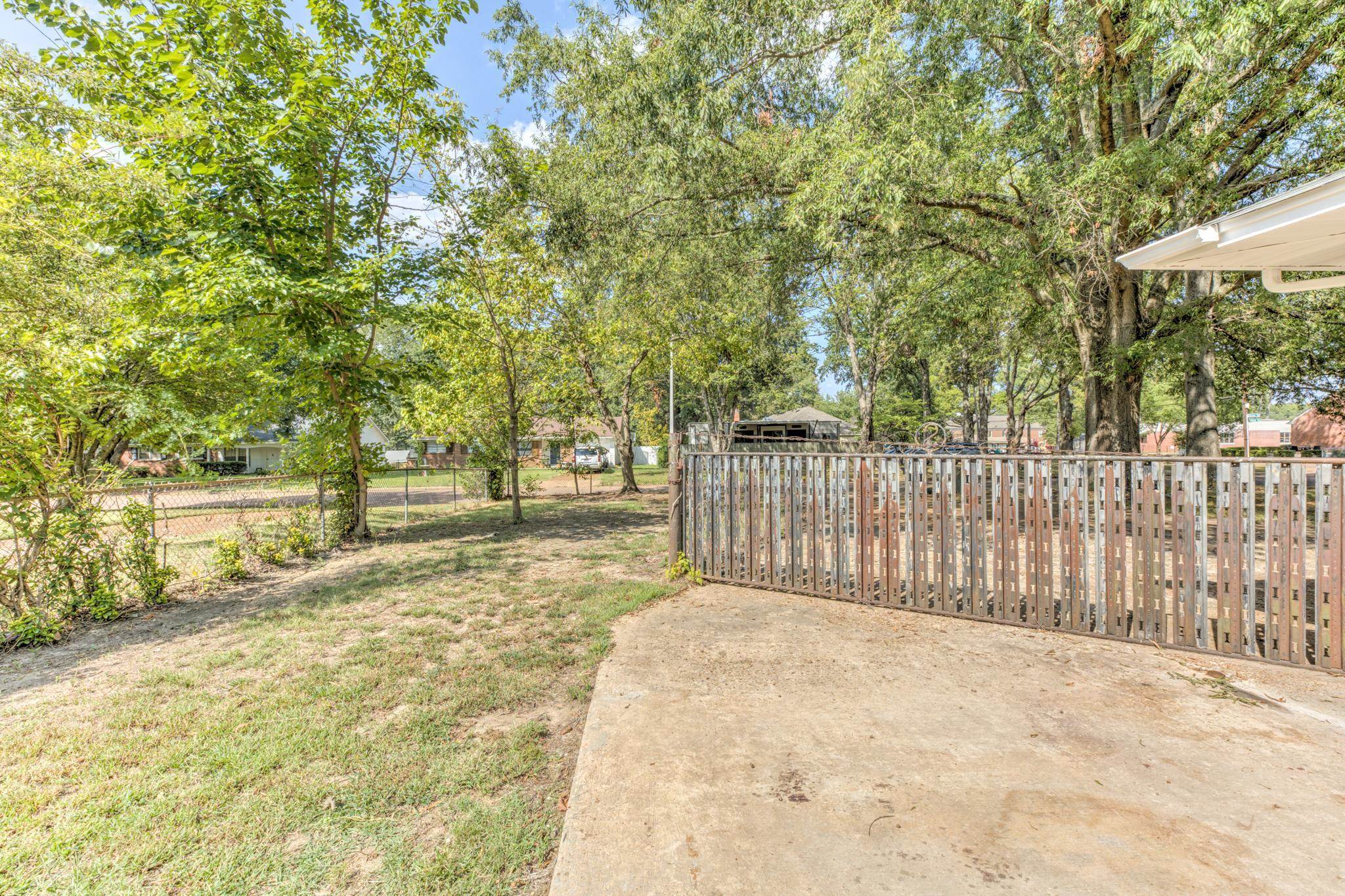 2823 Altruria Road Bartlett, TN 38134 - Photo 35 of 40 a view of a yard with wooden fence