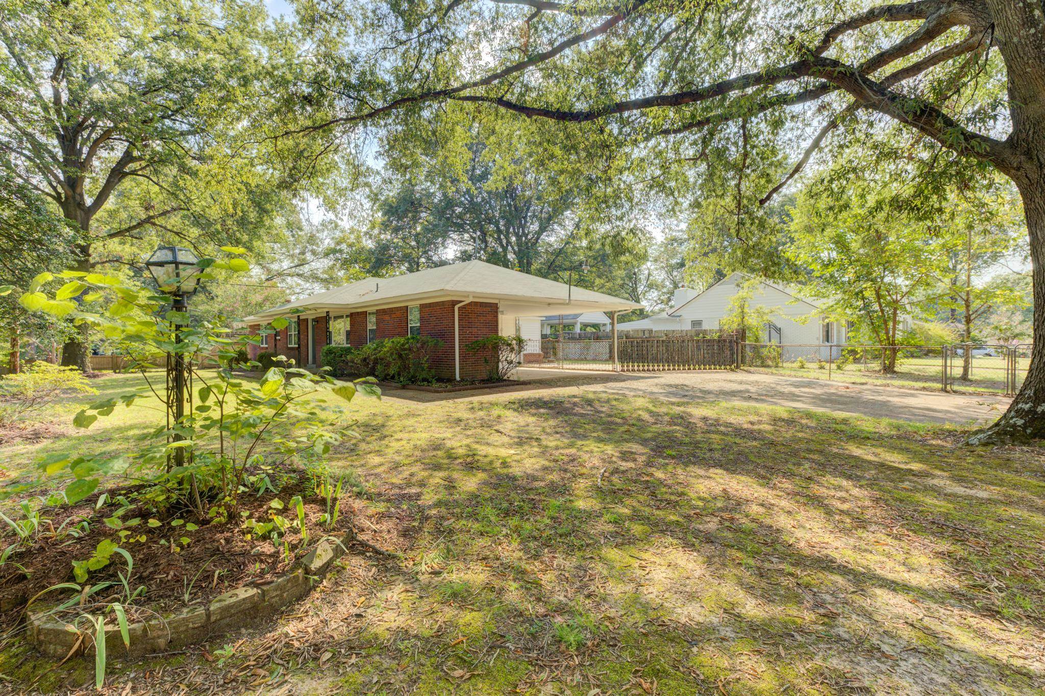 2823 Altruria Road Bartlett, TN 38134 - Photo 37 of 40 a front view of a house with a yard