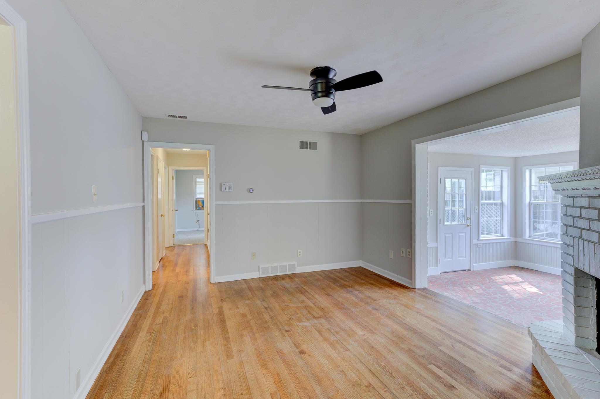 2823 Altruria Road Bartlett, TN 38134 - Photo 5 of 40 a view of empty room with wooden floor and fan