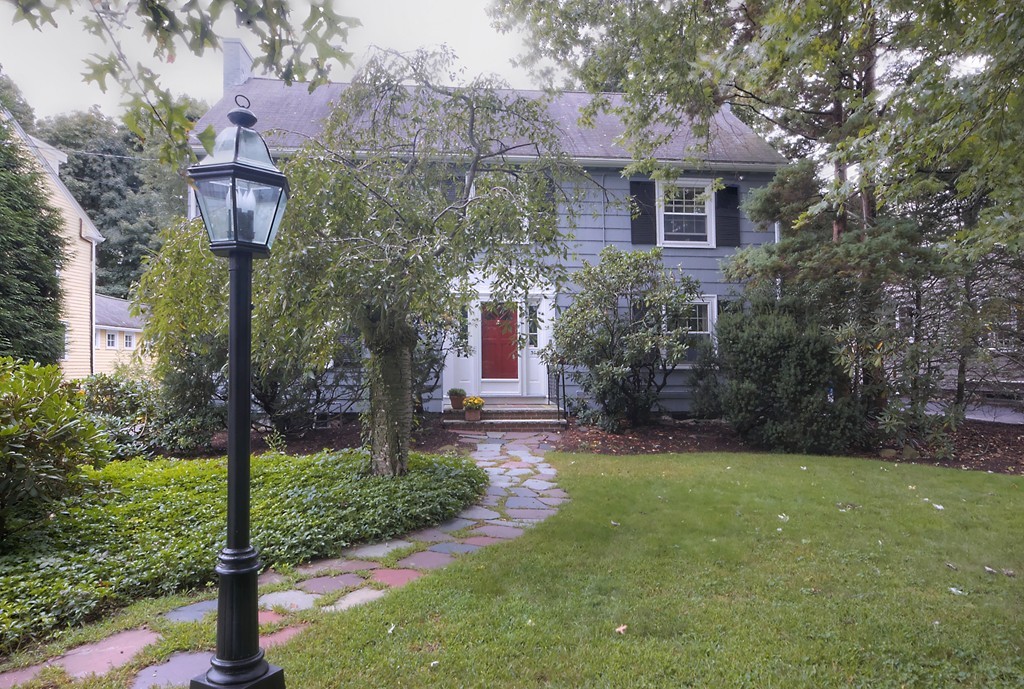 30 Rutledge Road Belmont, MA 02478 - Photo 1 of 30 a front view of a house with garden