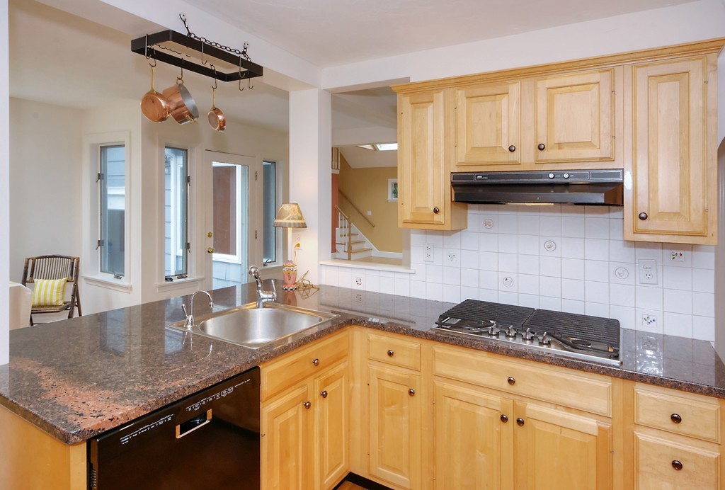 30 Rutledge Road Belmont, MA 02478 - Photo 13 of 30 a kitchen with a sink a stove and cabinets