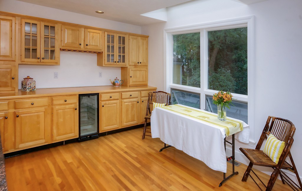 30 Rutledge Road Belmont, MA 02478 - Photo 15 of 30 a living room with stainless steel appliances granite countertop a kitchen island hardwood floor and a sink