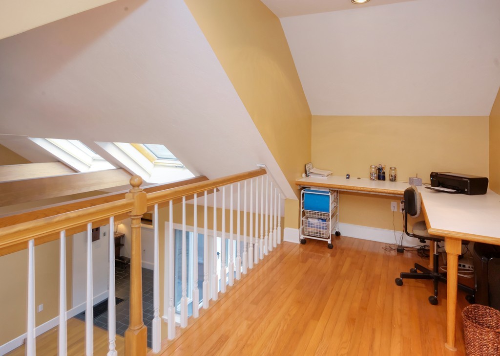 30 Rutledge Road Belmont, MA 02478 - Photo 20 of 30 a view of a hallway with workspace