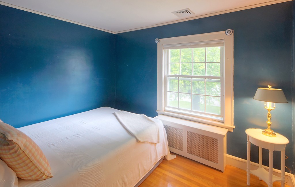 30 Rutledge Road Belmont, MA 02478 - Photo 22 of 30 a bedroom with a bed and a window