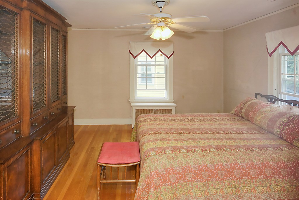 30 Rutledge Road Belmont, MA 02478 - Photo 24 of 30 a bedroom with a bed dresser and a window