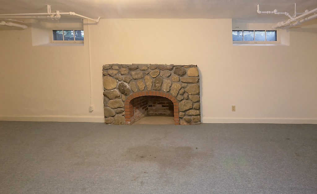 30 Rutledge Road Belmont, MA 02478 - Photo 28 of 30 a view of empty room with fireplace
