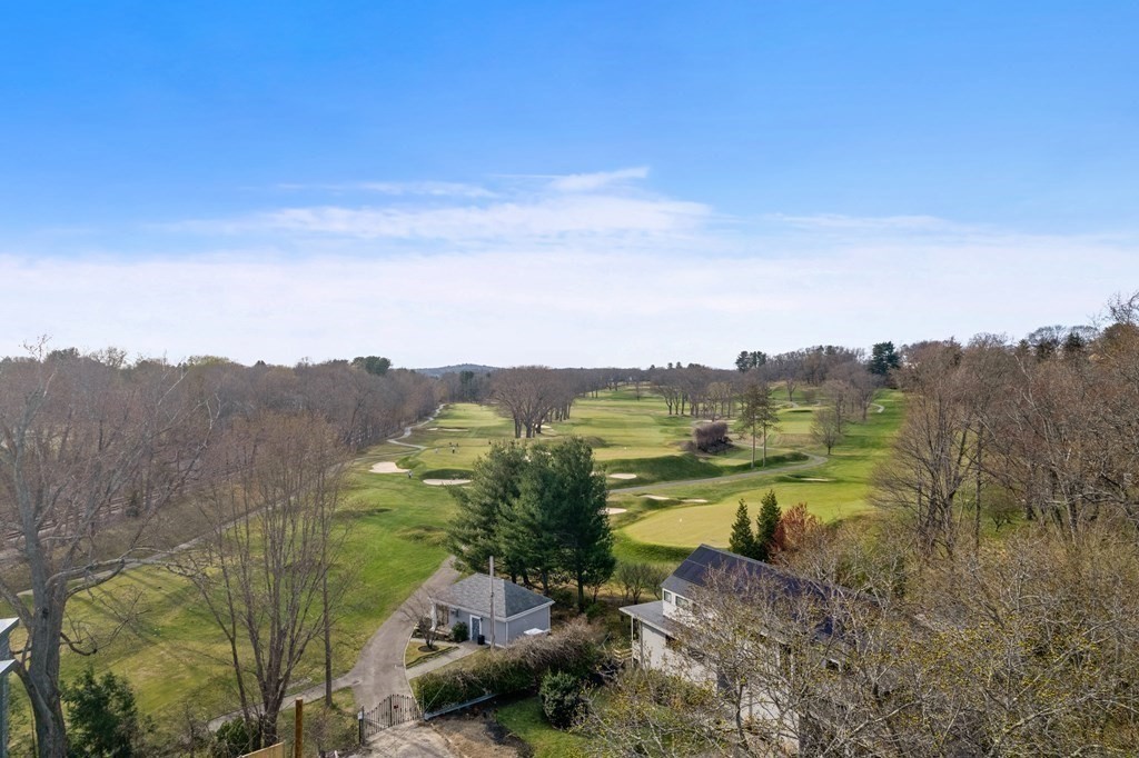 20 Kinmonth Road, Unit 108 Newton, MA 02468 - Photo 21 of 25 a view of a lake with mountains in the background