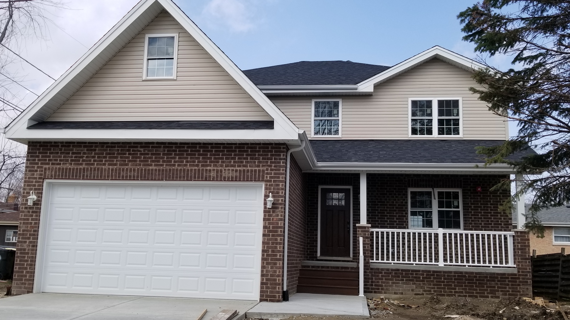 5749 West 109th Street Chicago Ridge, IL 60415 - Photo 1 of 22 a front view of a house with a garage