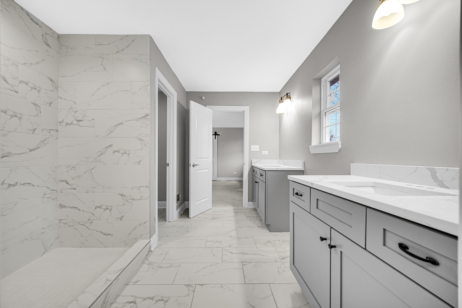 5749 West 109th Street Chicago Ridge, IL 60415 - Photo 16 of 22 a spacious bathroom with a granite countertop sink mirror and a bathtub