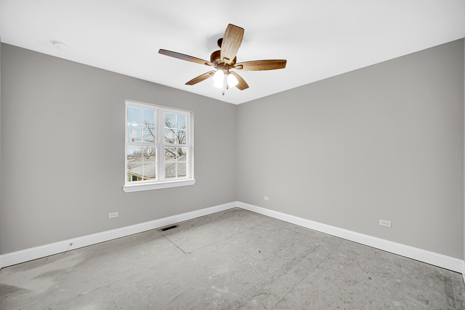 5749 West 109th Street Chicago Ridge, IL 60415 - Photo 18 of 22 an empty room with windows and fan
