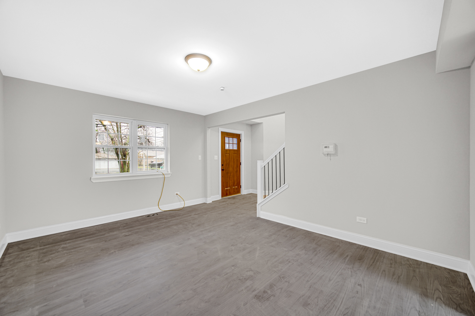 5749 West 109th Street Chicago Ridge, IL 60415 - Photo 4 of 22 a view of an empty room with a window
