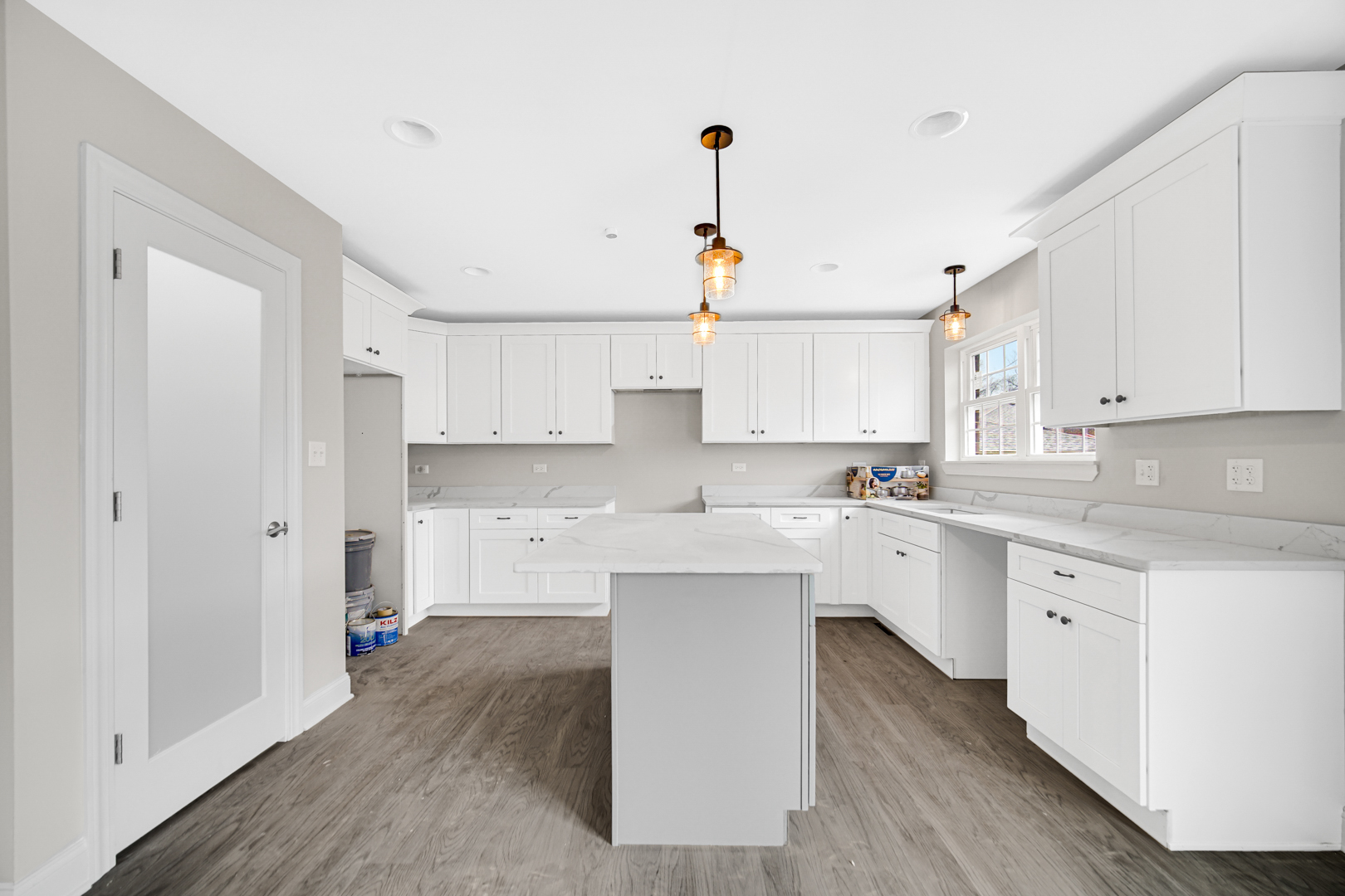 5749 West 109th Street Chicago Ridge, IL 60415 - Photo 5 of 22 a kitchen with white cabinets appliances and a sink