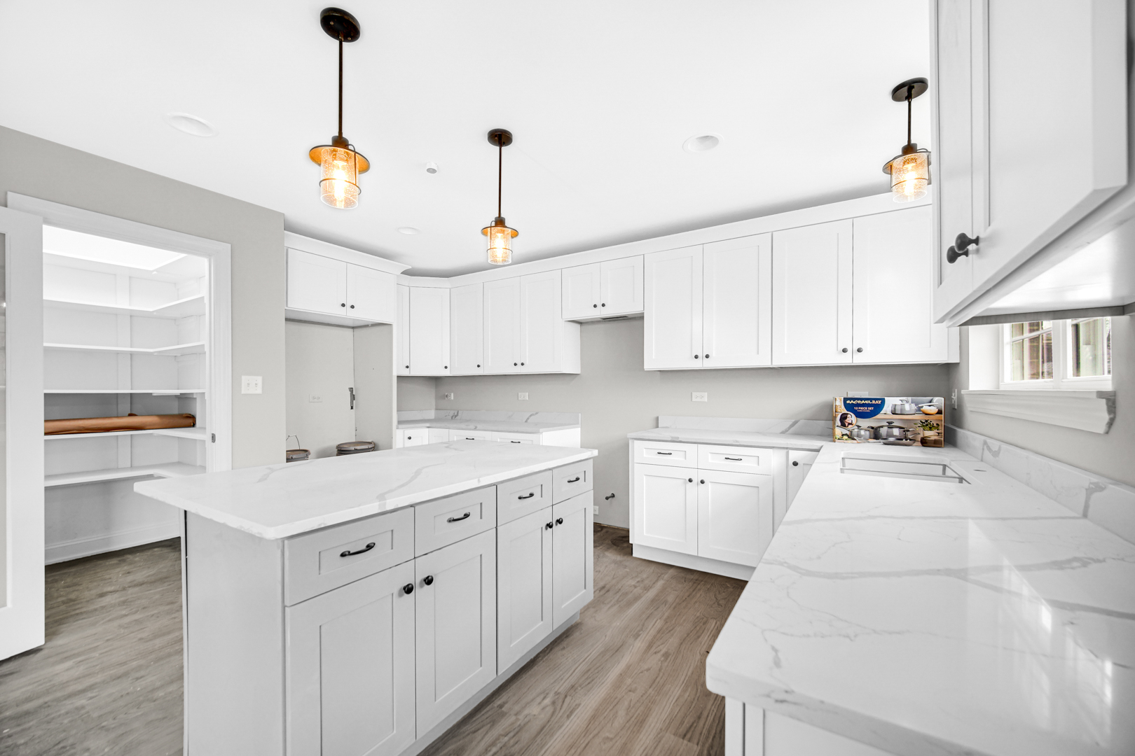 5749 West 109th Street Chicago Ridge, IL 60415 - Photo 6 of 22 a kitchen with a white cabinets and wooden floor