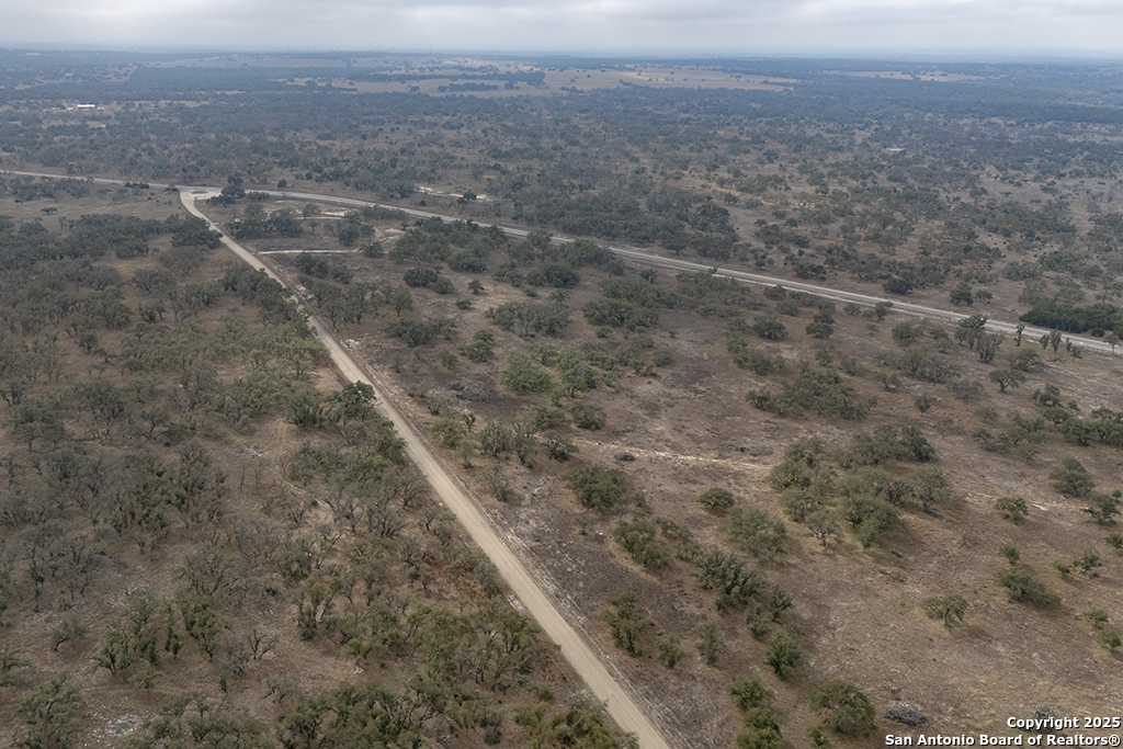 0 Fiedler Rd Off S Ranch Rd 783 Harper, TX 78631 - Photo 19 of 27 a view of a dry yard with wooden floor and fence
