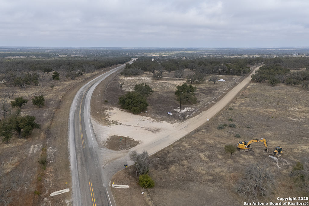 0 Fiedler Rd Off S Ranch Rd 783 Harper, TX 78631 - Photo 23 of 27 a view of a dry yard with wooden fence