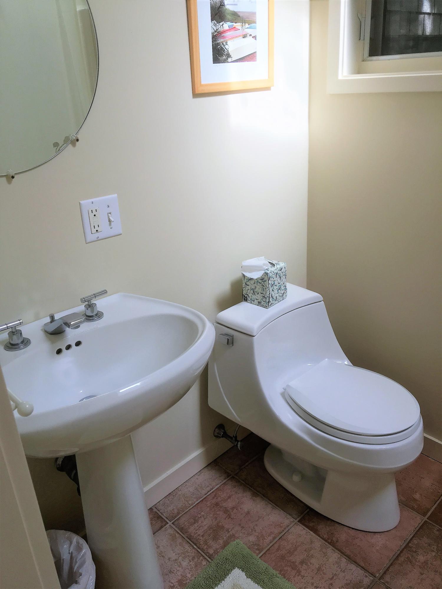 27 Briar Spring Road Orleans, MA 02653 - Photo 16 of 32 a bathroom with a sink and a toilet