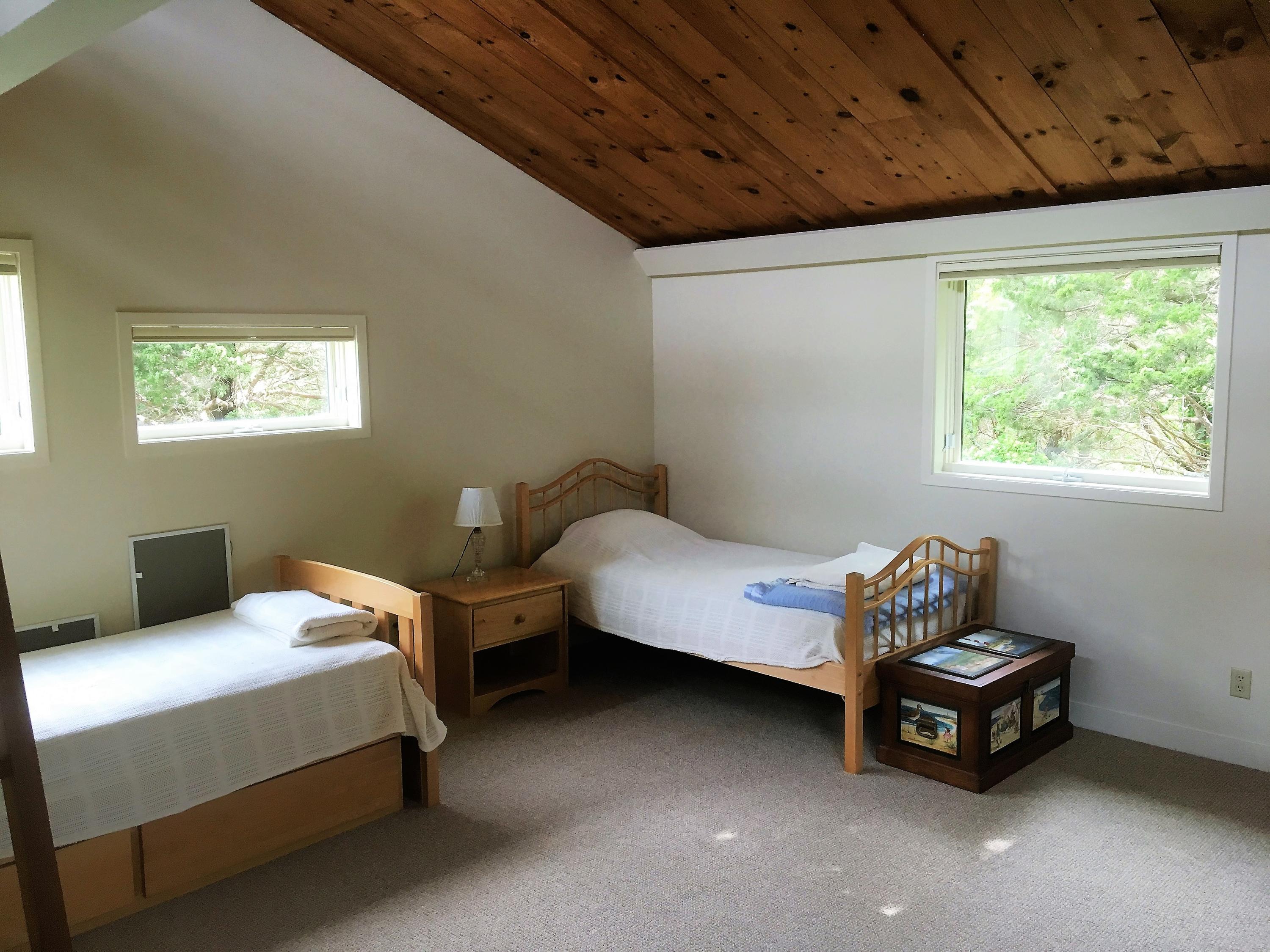 27 Briar Spring Road Orleans, MA 02653 - Photo 24 of 32 a bedroom with bed and a window