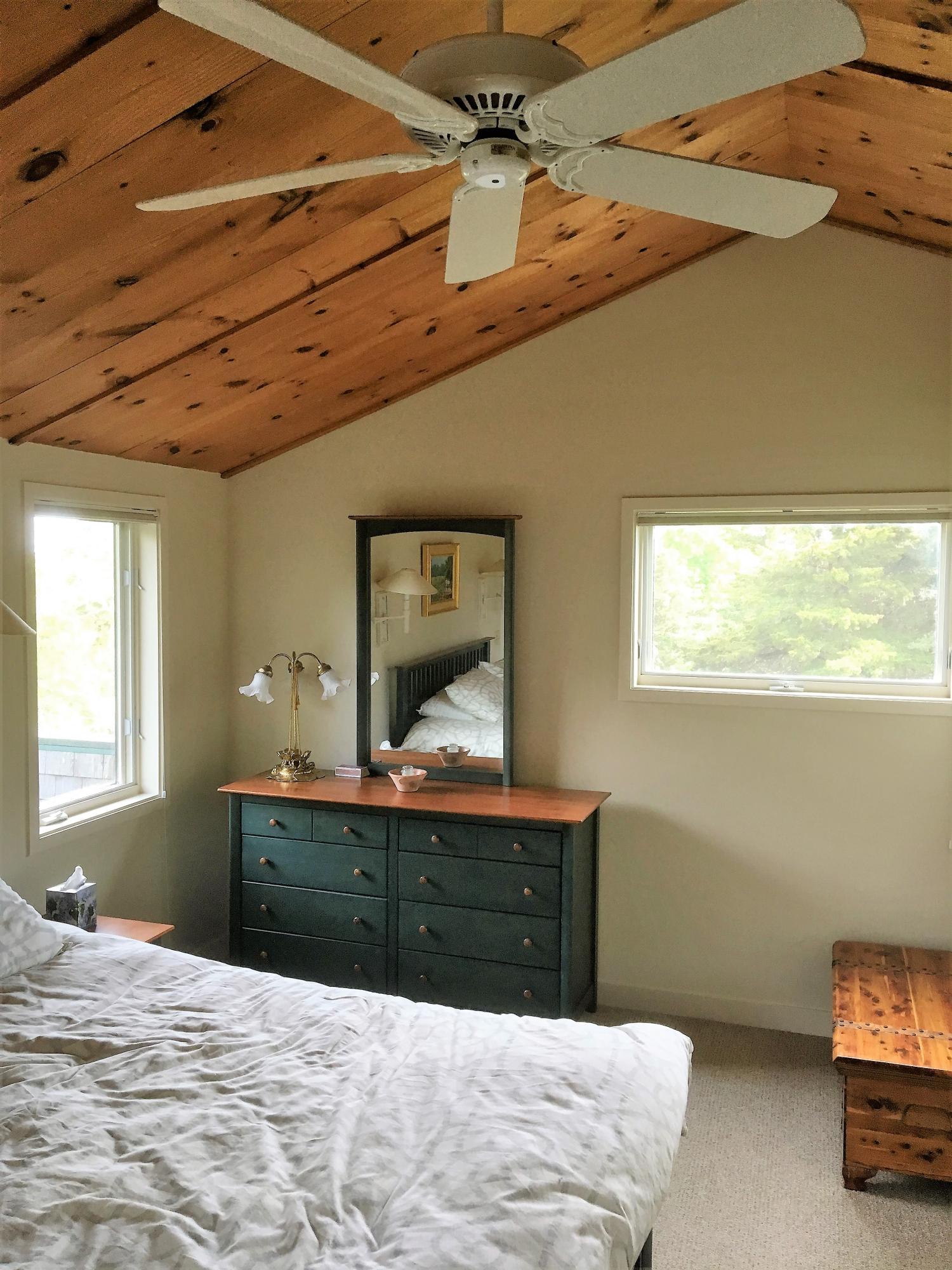 27 Briar Spring Road Orleans, MA 02653 - Photo 27 of 32 a bedroom with a bed and a window