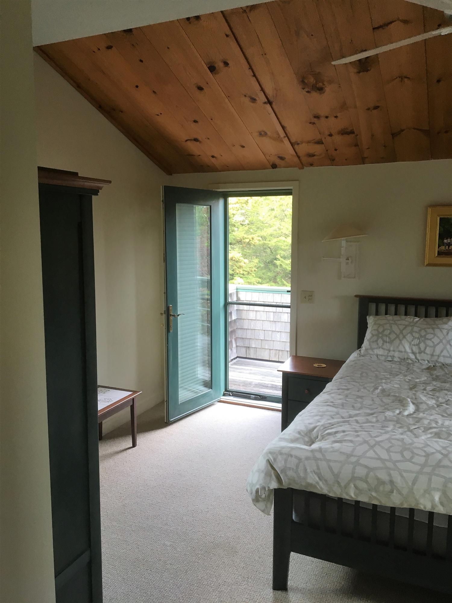 27 Briar Spring Road Orleans, MA 02653 - Photo 28 of 32 a bedroom with a bed and a window