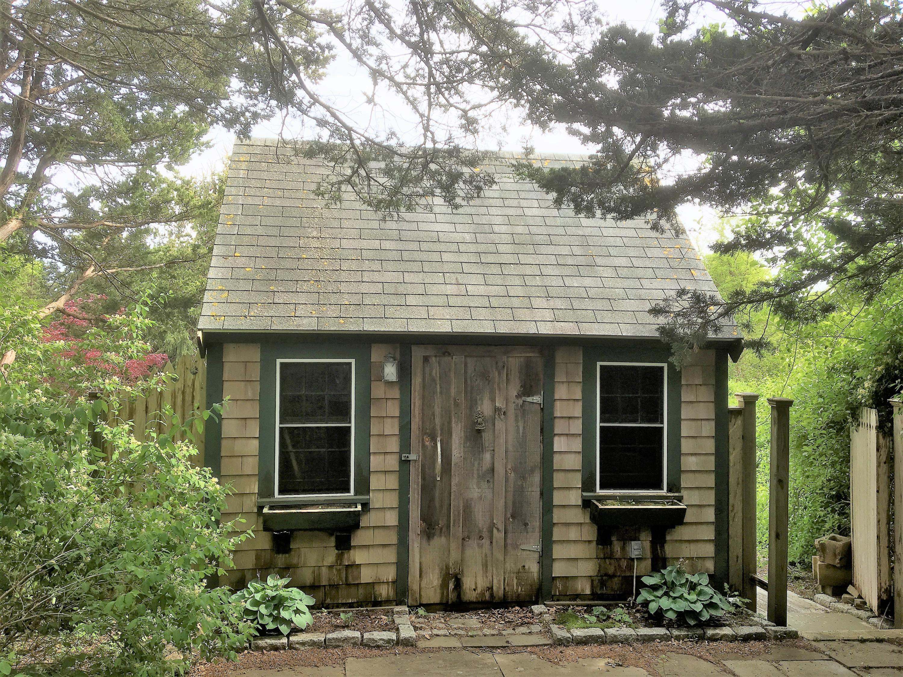 27 Briar Spring Road Orleans, MA 02653 - Photo 4 of 32 a front view of a house with tree s
