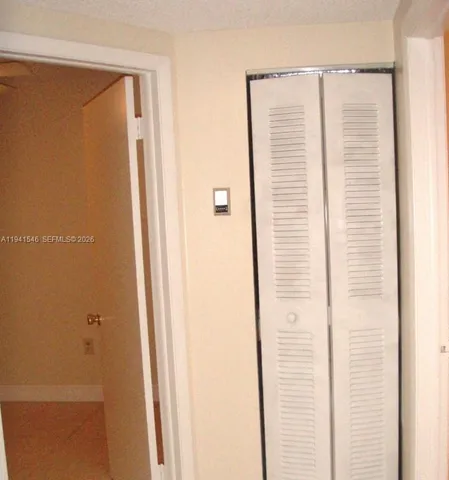 a view of a bedroom with a window