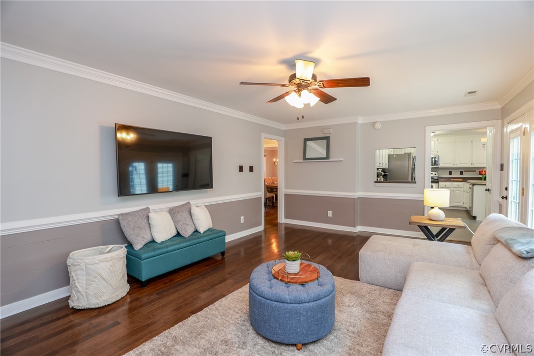 5219 Rock Harbour Road Midlothian, VA 23112 - Photo 14 of 50 a living room with furniture and a wooden floor