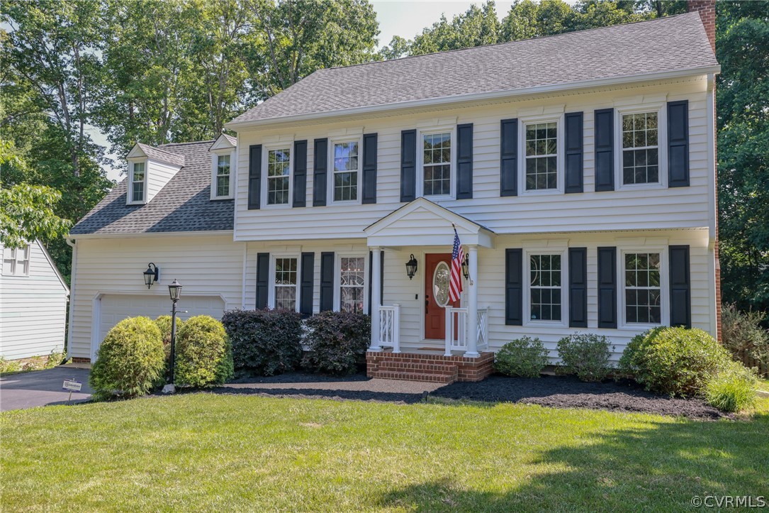 5219 Rock Harbour Road Midlothian, VA 23112 - Photo 2 of 50 a front view of a house with a yard