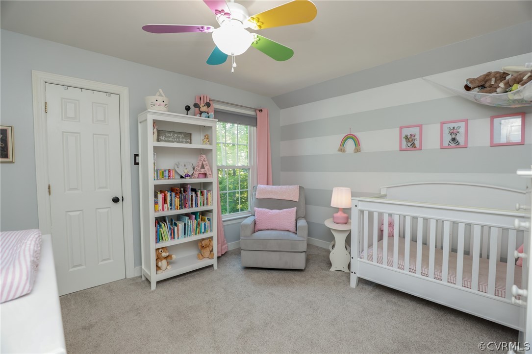 5219 Rock Harbour Road Midlothian, VA 23112 - Photo 28 of 50 a bedroom with furniture and a book shelf