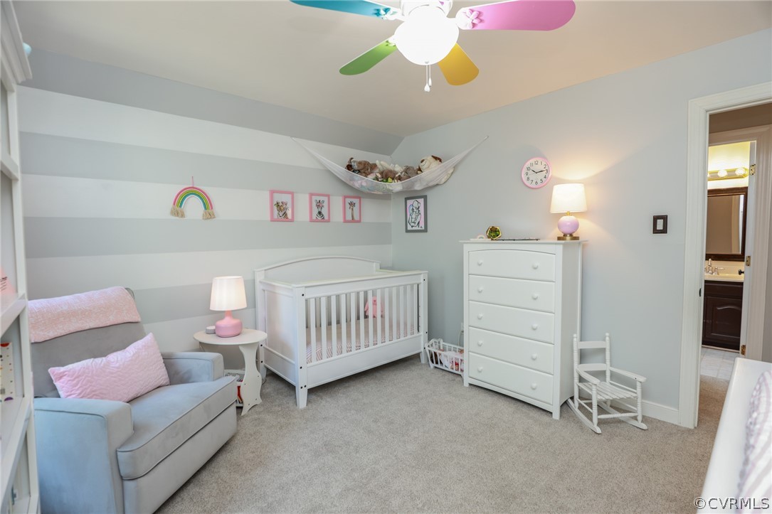 5219 Rock Harbour Road Midlothian, VA 23112 - Photo 29 of 50 a bedroom with furniture and a chandelier