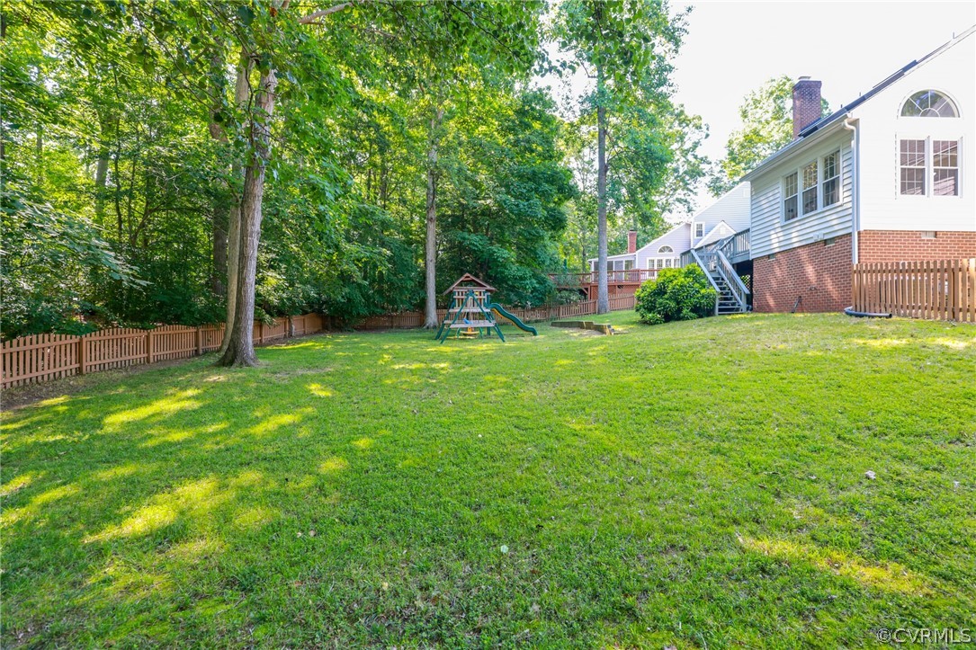 5219 Rock Harbour Road Midlothian, VA 23112 - Photo 39 of 50 a view of a house with a yard and a tree