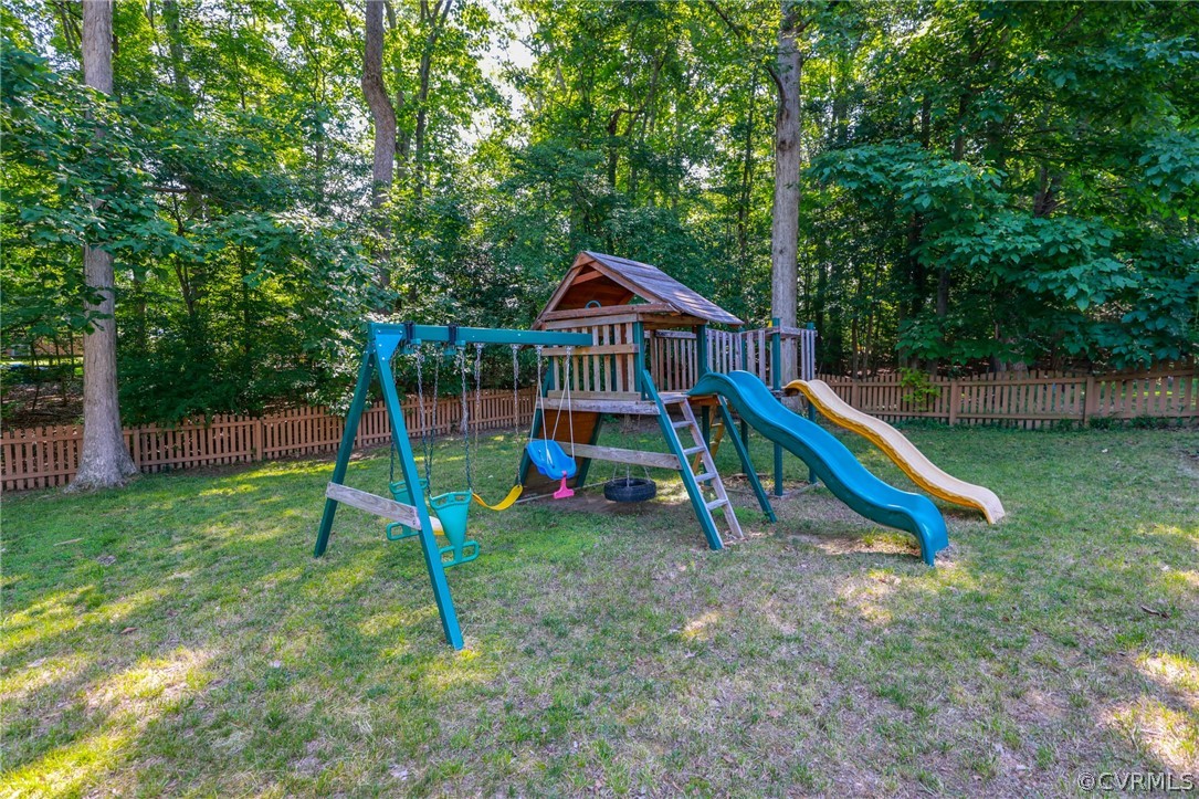 5219 Rock Harbour Road Midlothian, VA 23112 - Photo 40 of 50 a view of a house with a park