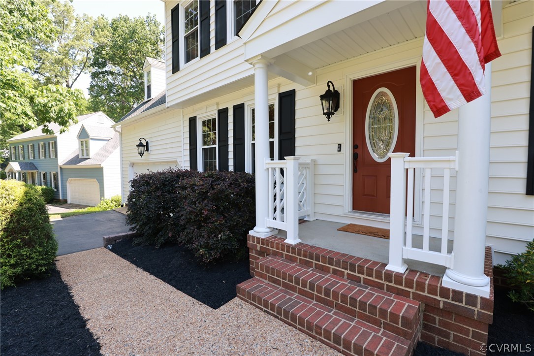 5219 Rock Harbour Road Midlothian, VA 23112 - Photo 4 of 50 a front view of a house with garden