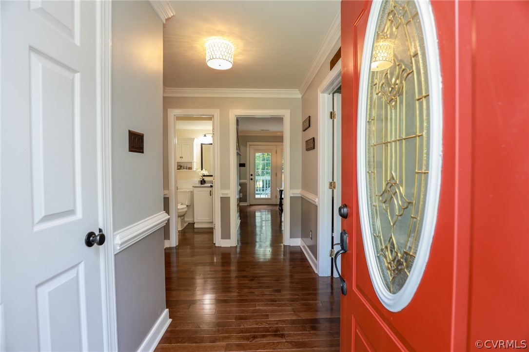 5219 Rock Harbour Road Midlothian, VA 23112 - Photo 5 of 50 a view of a hallway with wooden floor and windows