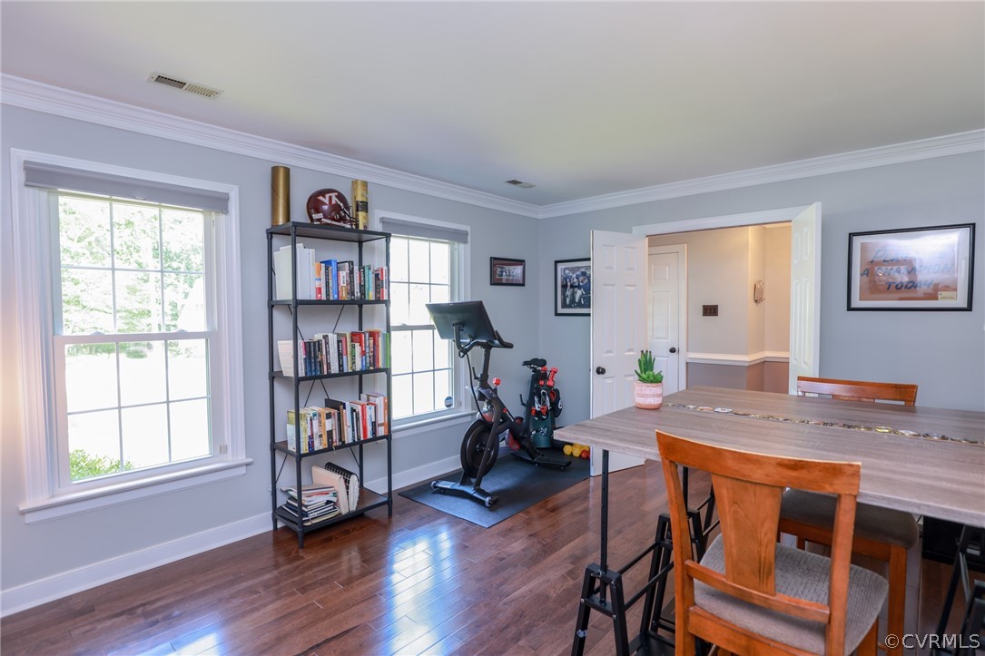 5219 Rock Harbour Road Midlothian, VA 23112 - Photo 9 of 50 a room with furniture and a wooden floor