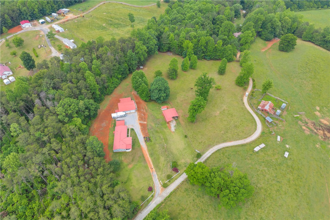 721 Cedar Crest Trail Walhalla, SC 29691 - Photo 39 of 47 Discover a private rural retreat with multiple structures nestled amidst verdant fields and mature trees.