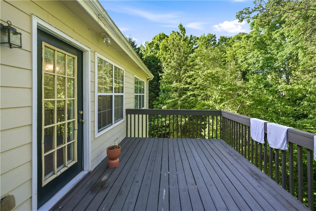 3324 Dunbar Lane Suwanee, GA 30024 - Photo 14 of 42 a balcony with wooden floor