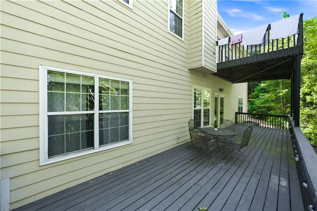 3324 Dunbar Lane Suwanee, GA 30024 - Photo 39 of 42 a view of a house with a deck
