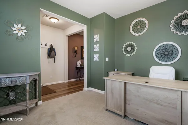 a view of livingroom with washer and dryer