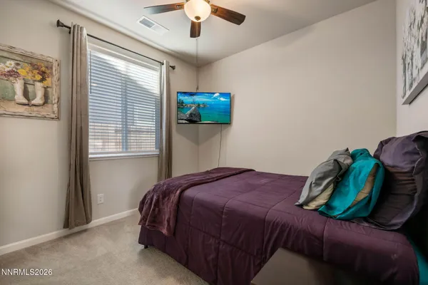 a bathroom with a sink a mirror and vanity