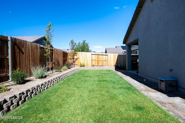 a backyard of a house with seating space