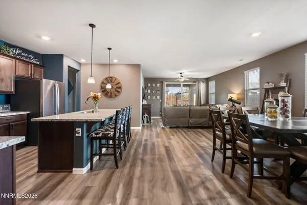 a view of a dining room with furniture