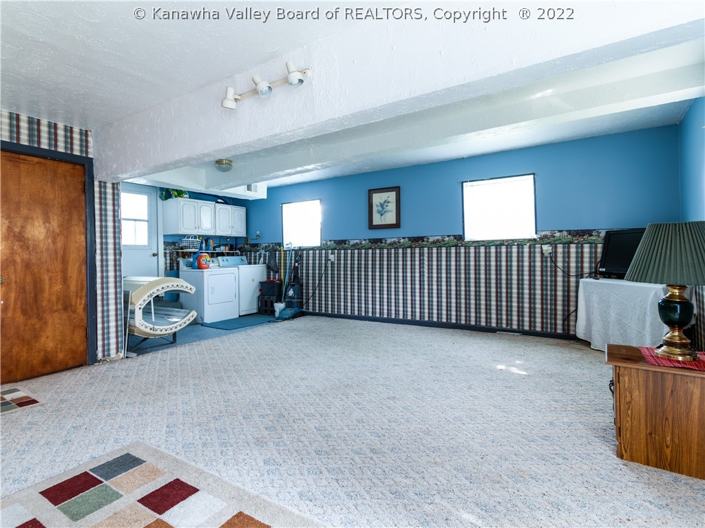2 Route Milton, WV 25541 - Photo 18 of 40 main house family room/ laundry area in the back