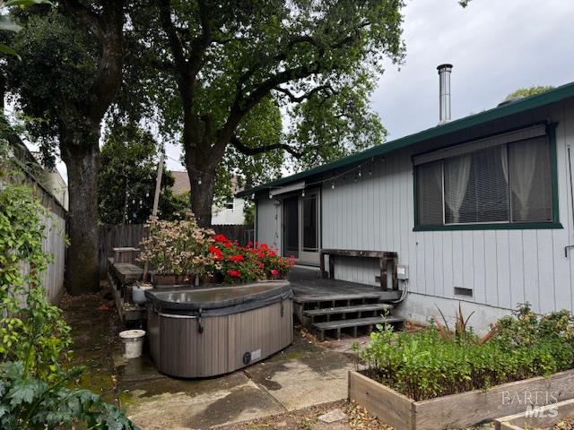 424 B Mason Street Healdsburg, CA 95448 - Photo 6 of 27 a wooden bench sitting in front of a house