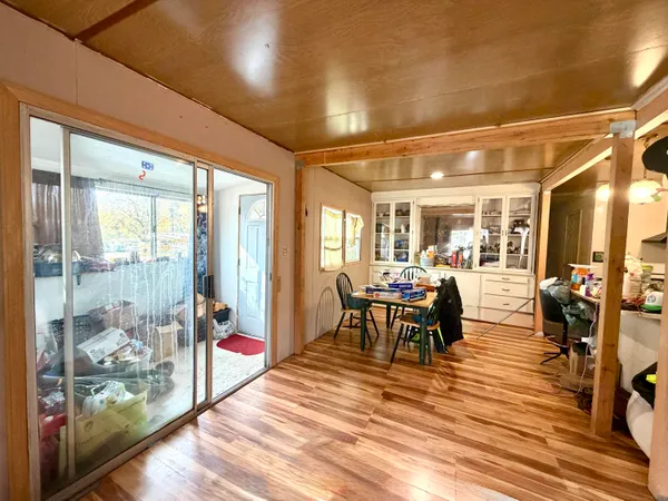 a kitchen filled with a stove and a refrigerator