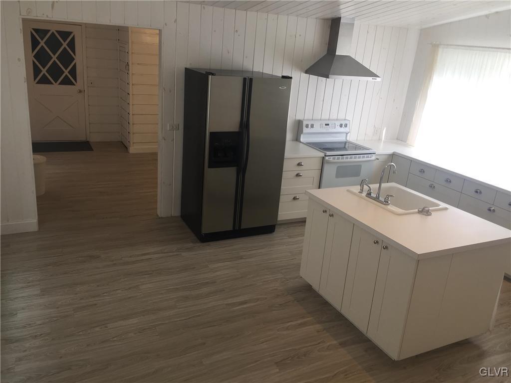 1710 Johns Road Effort, PA 18330 - Photo 8 of 27 a kitchen with a sink refrigerator and microwave